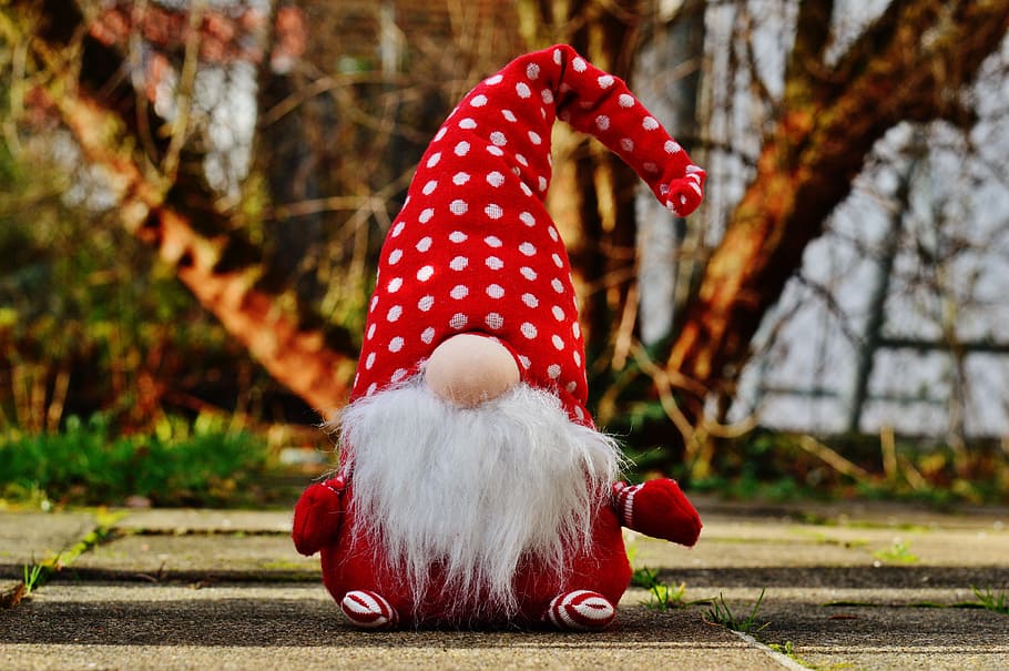 gnome plush toy placed on gray pavement, Imp, Cute, Sweet, Fun