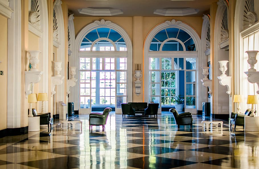 Quitandinha, black leather sofas and sofa chairs inside building HD wallpaper
