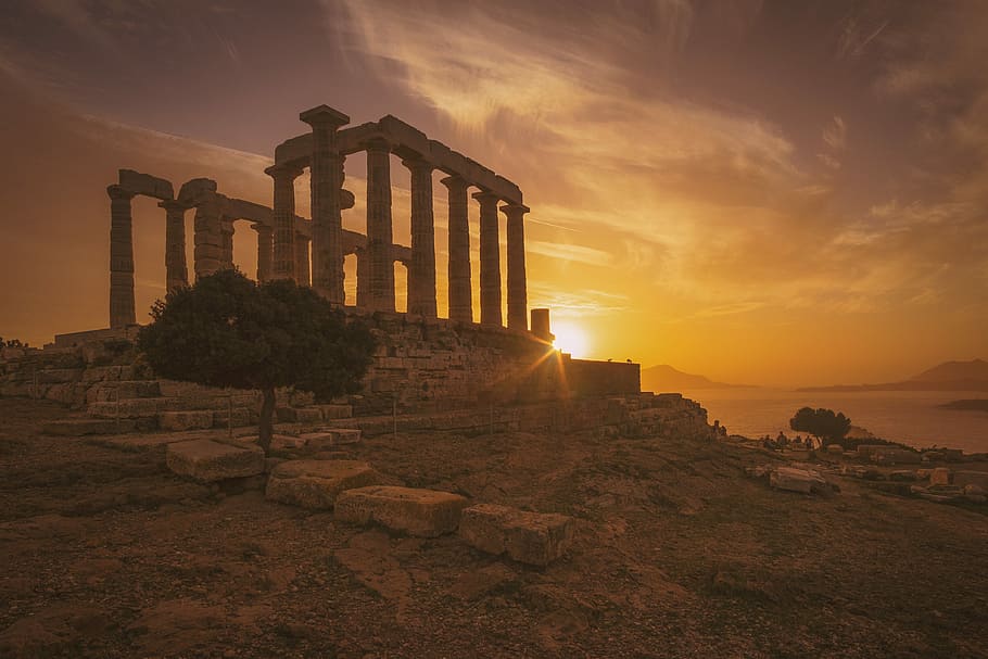 white concrete temple frame near body of water, brown concrete ruins during golden hour HD wallpaper