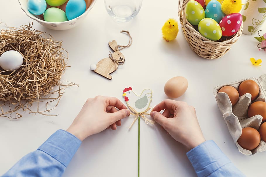 person's hands near brown eggs, easter, food, easter egg, nest HD wallpaper