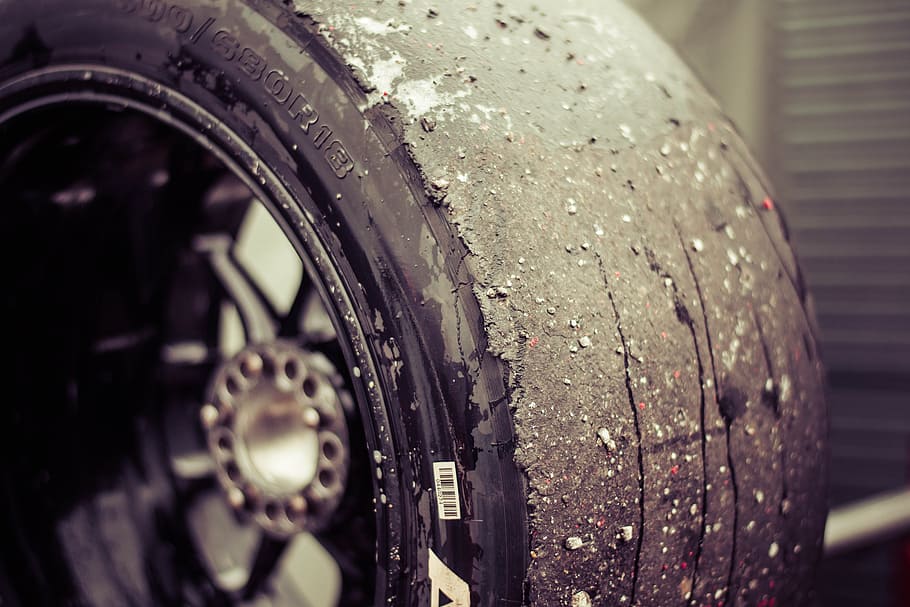 black vehicle wheel and tire in close-up photo, race car, tyre