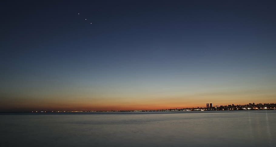 ocean near houses and buildings during sunset, nature, landscape HD wallpaper
