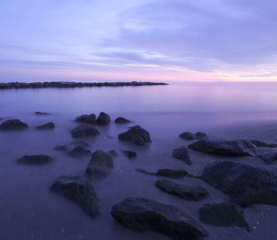 black stones near seashore during daytime, sunset, ocean, beach HD wallpaper