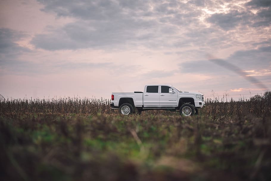 parked white pickup truck, car, grass, field, cloud, mode of transportation HD wallpaper
