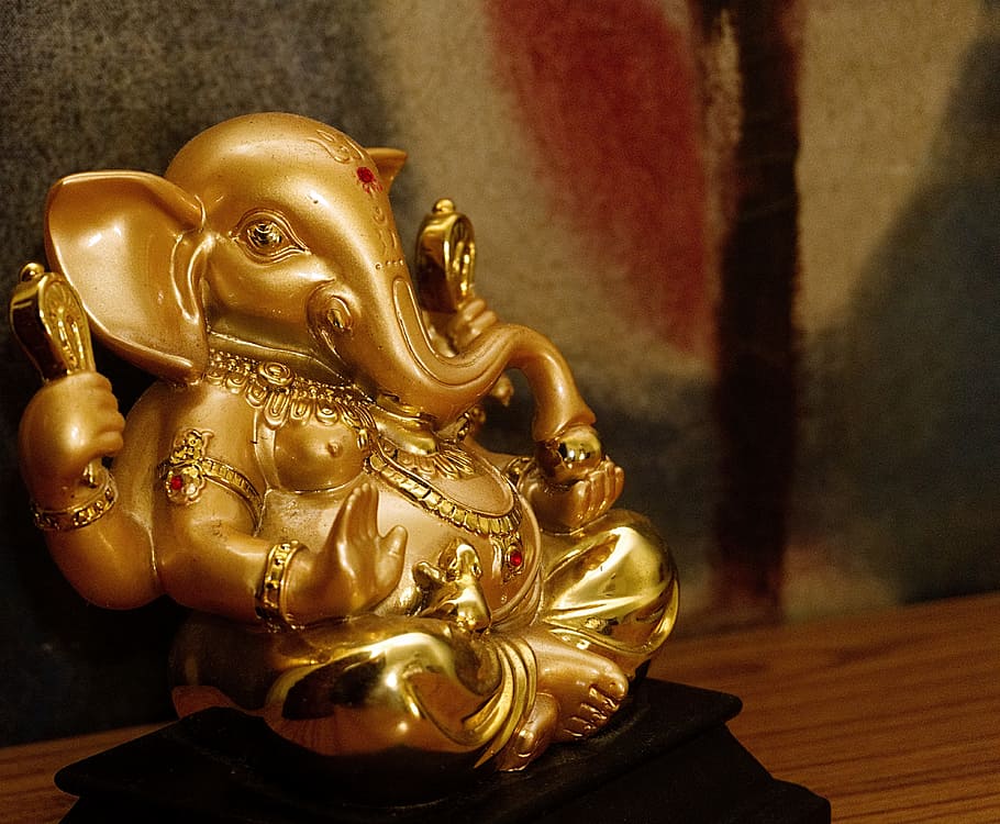 HD wallpaper: selective focus photography of gold Lord Ganesha figurine,  ganapathi | Wallpaper Flare