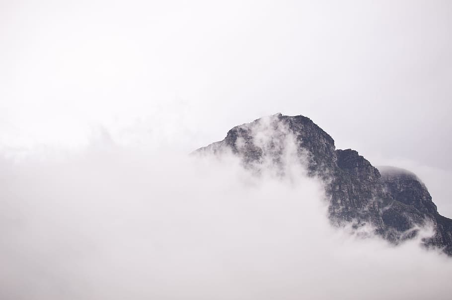 gray mountain covered by mountain, mountain surrounded by clouds HD wallpaper