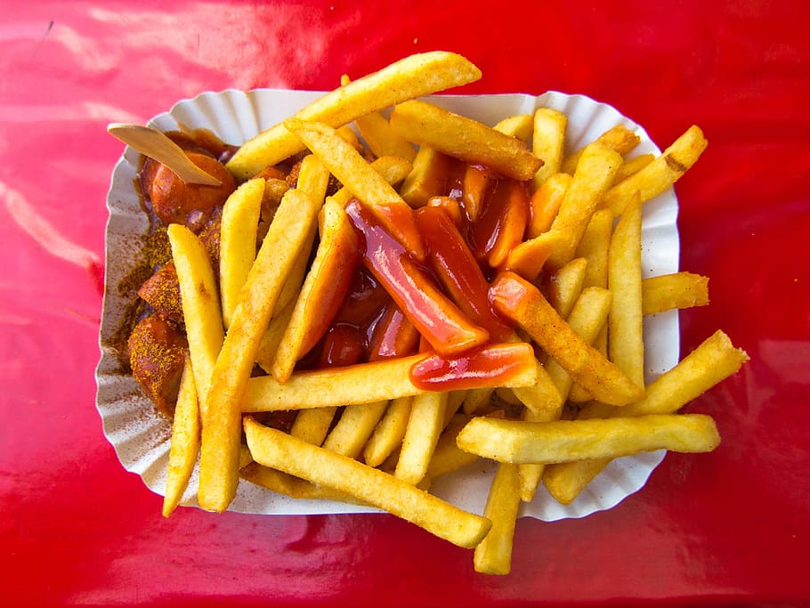 potato fries with sauce, currywurst, french fries, ketchup, eat