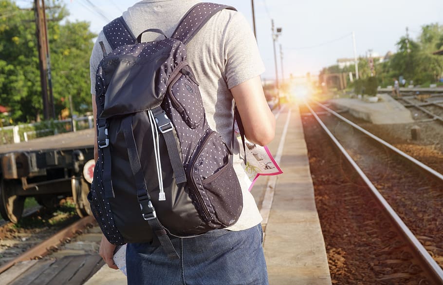 light, man, person, train, alone, backpack, bag, commuter, day HD wallpaper