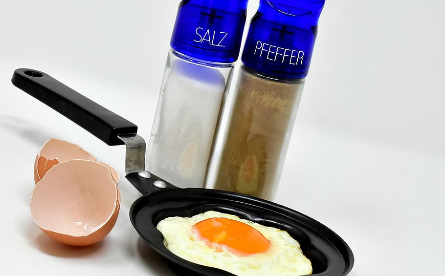 sunny side-up egg on black frying pan, fried, fried eggs, eat