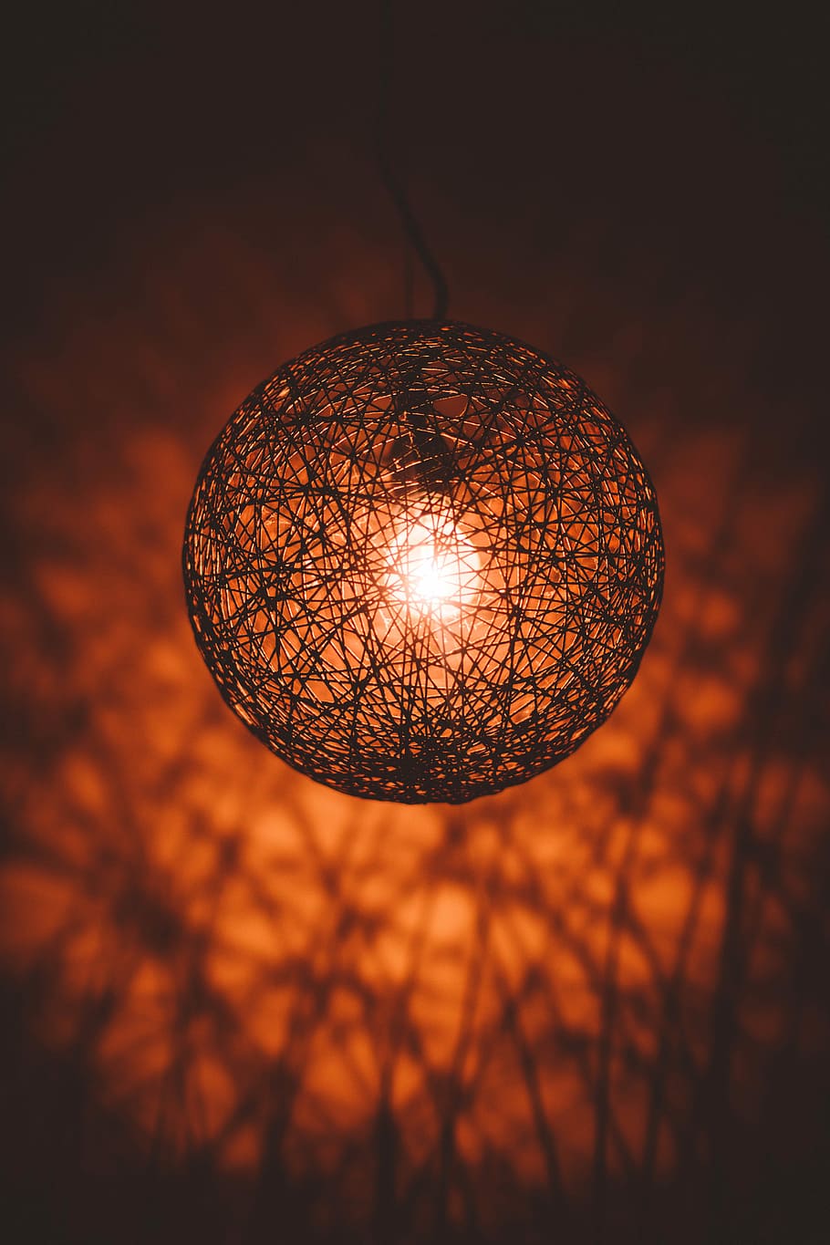 selective focus photography of round wire pendant lamp, selective focus photo of round red light bulb HD wallpaper