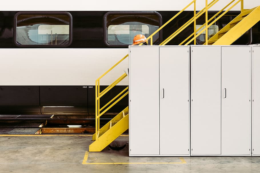 yellow steel stare, white wooden cabinet beside yellow steel stairs HD wallpaper