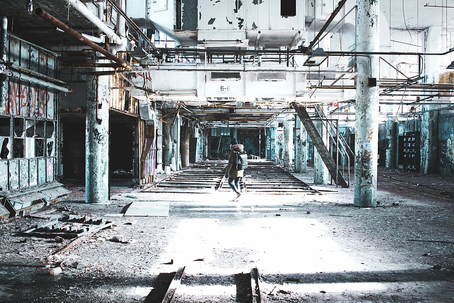 person inside building, person in an abandoned building, urban decay