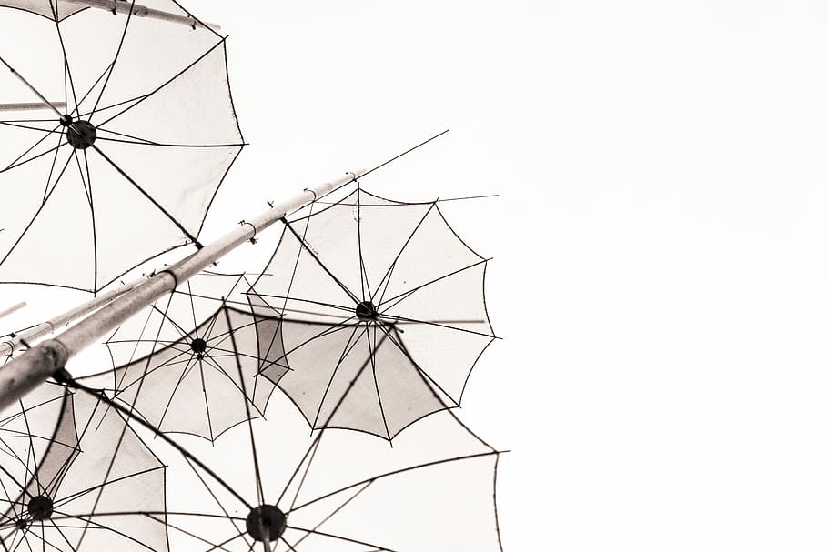 umbrellas outline under white sky at daytime, gray metal antenna tower HD wallpaper