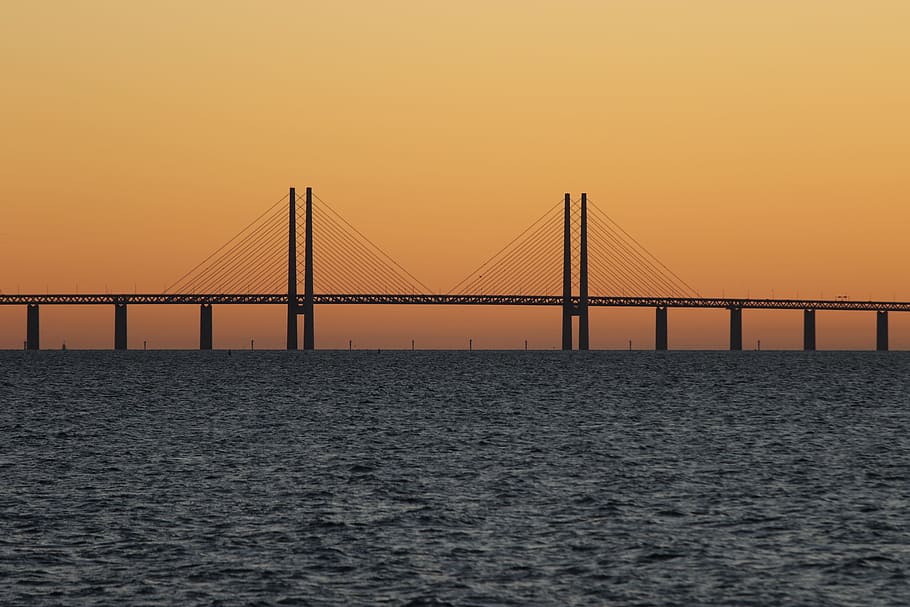 bridge during sunset with body of water, photo of bridge during sunset HD wallpaper