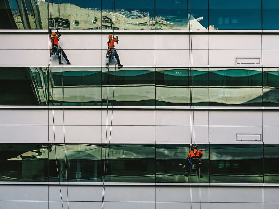 three person climbing on building at daytime, windows, washing HD wallpaper