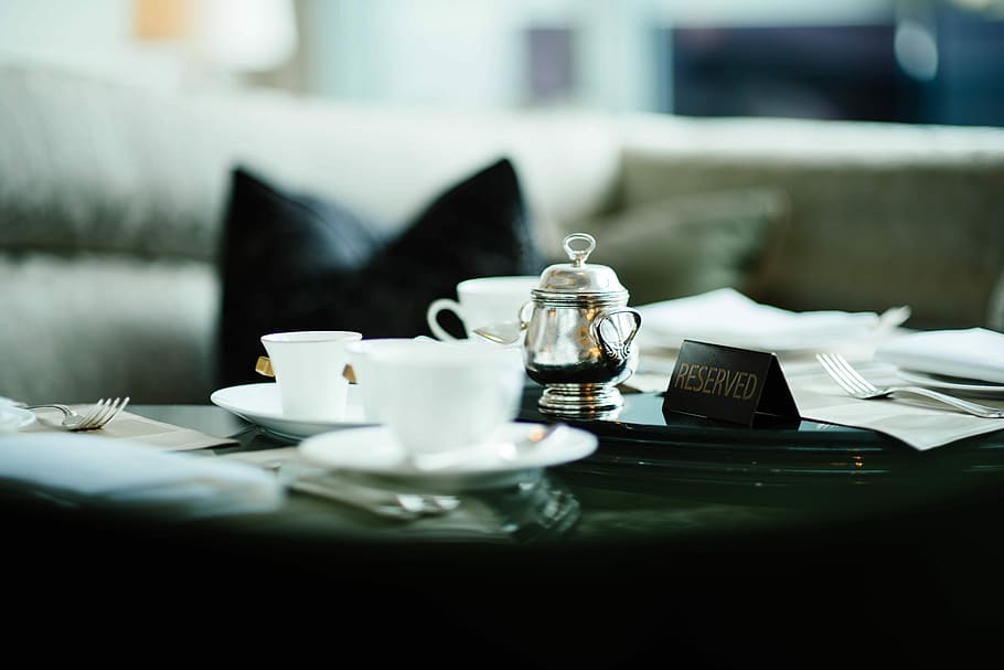 grey stainless steel container with white ceramic cups and saucers set, closeup photo of three white tea cups HD wallpaper