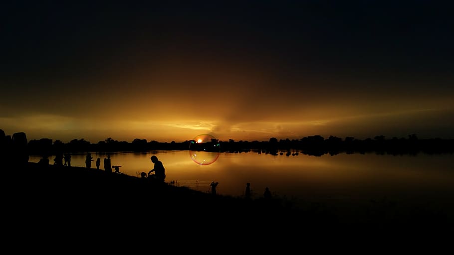 sunset, lake, bubble, water, yellow, nature, silhouette, reflection HD wallpaper