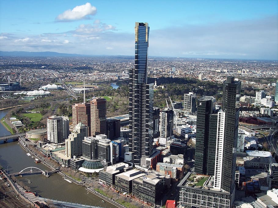 aerial photo of black and grey high rise building at daytime HD wallpaper