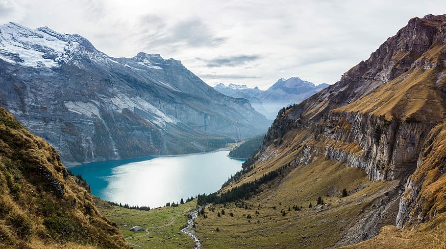 brown mountains viewing lake, snow, rock, cliff, mountain range HD wallpaper