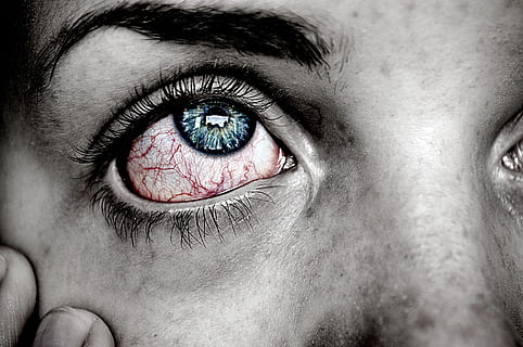 selective color photography of person with bloodshot eyes and blue iris HD wallpaper