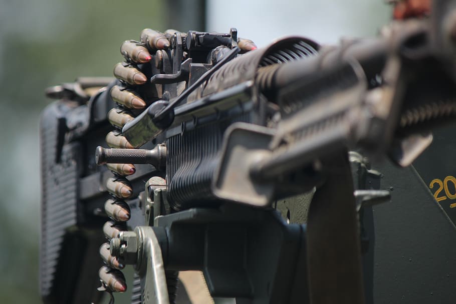 closeup photo of black machine gun, m60, army, firearm, weapon