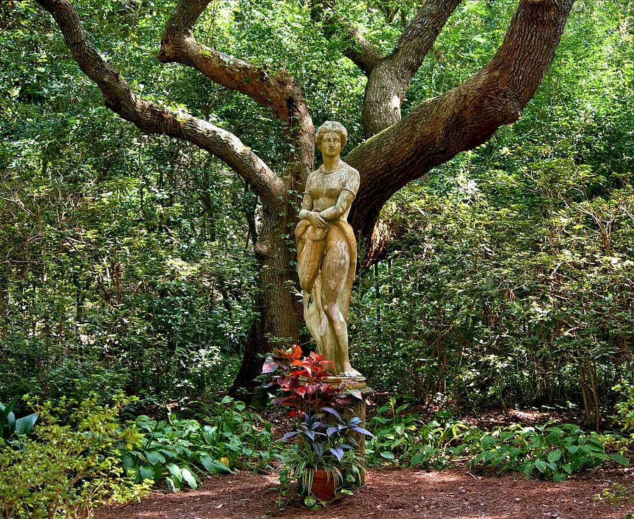 woman statue in front beside green leafed trees, Garden Sculpture