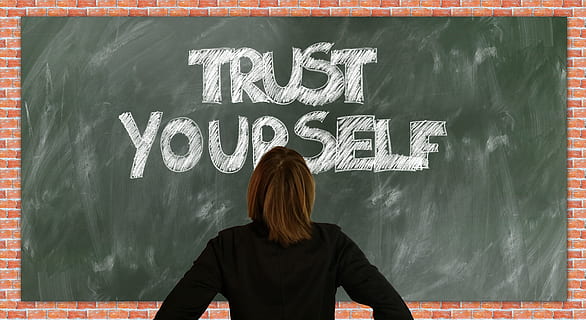 woman wearing black shirt standing in front of chalk board HD wallpaper