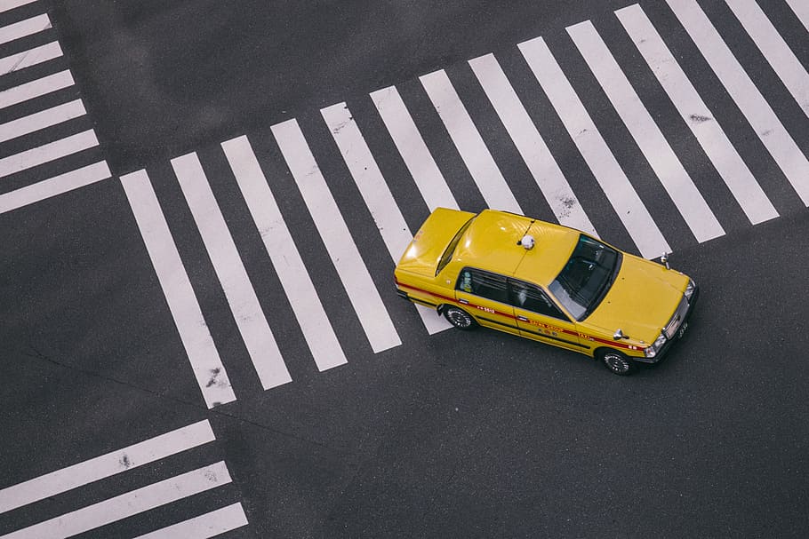 yellow taxi on gray pave road during daytime, yellow cab on pedestrian lane HD wallpaper