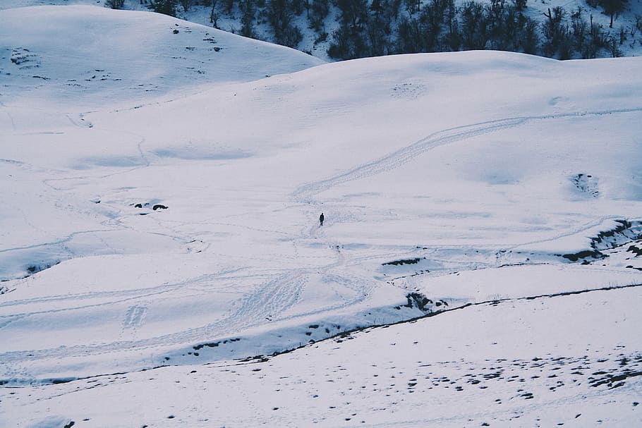 person on snow field, man walking on snow field during day time HD wallpaper
