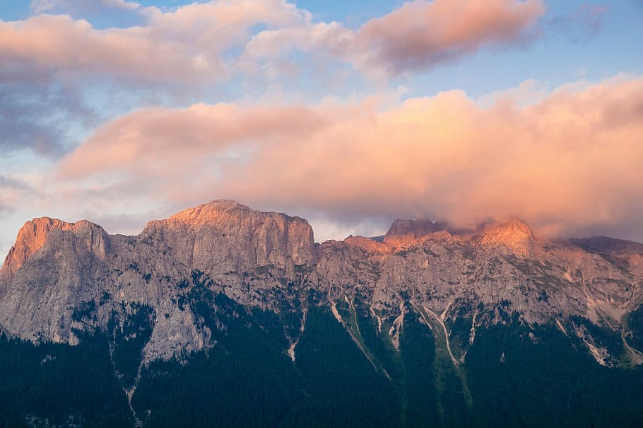 afterglow, clouds, rocks, landscape, extreme, high, sunlight HD wallpaper