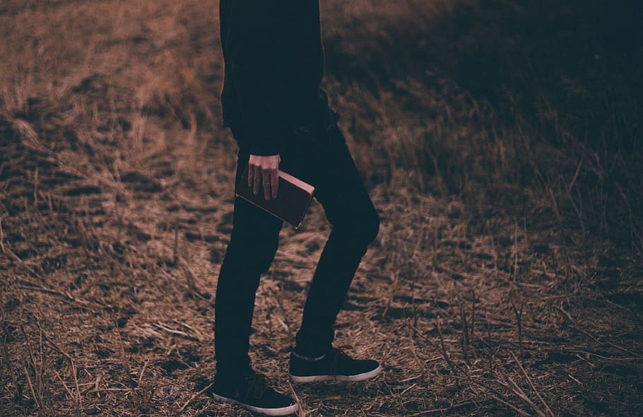 man, guy, book, grass, fashion, hand, black, field, footwear HD wallpaper