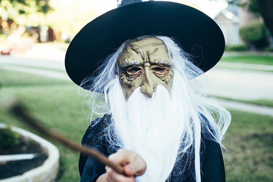 person wearing witch costume, person wearing witch mask, wizard HD wallpaper