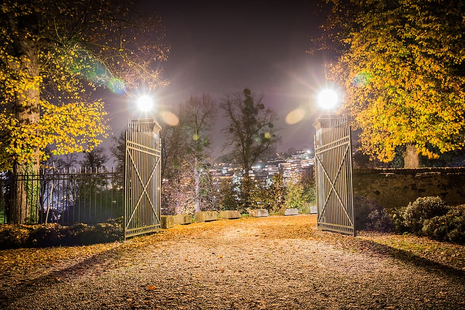 landscape photo of opened gate during nighttime, castle gate HD wallpaper