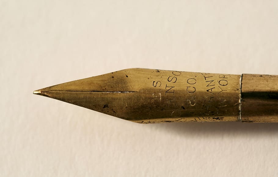 closeup photo of gold fountain pen, brown pen, nib, paper, parchment HD wallpaper