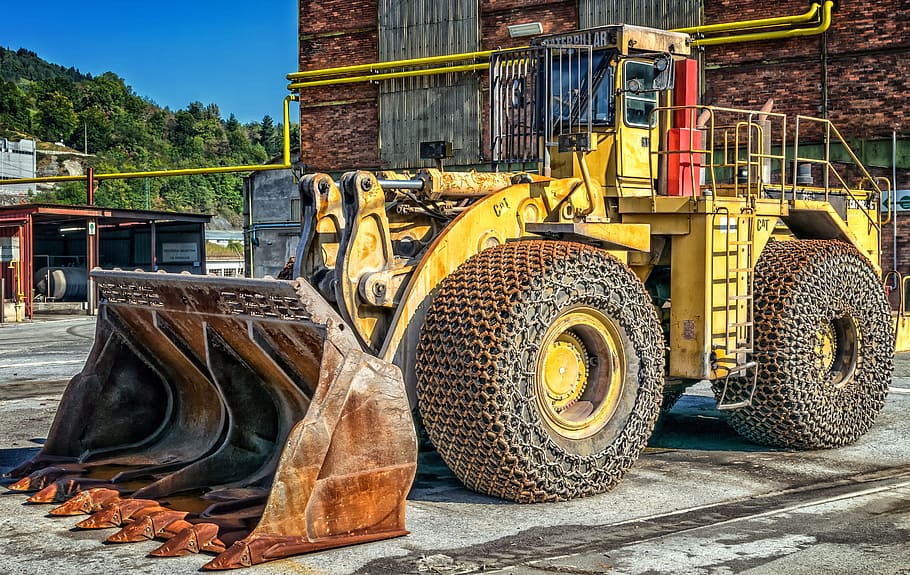 yellow front-loader outside the building, wheel loader, cat, caterpillar, HD wallpaper