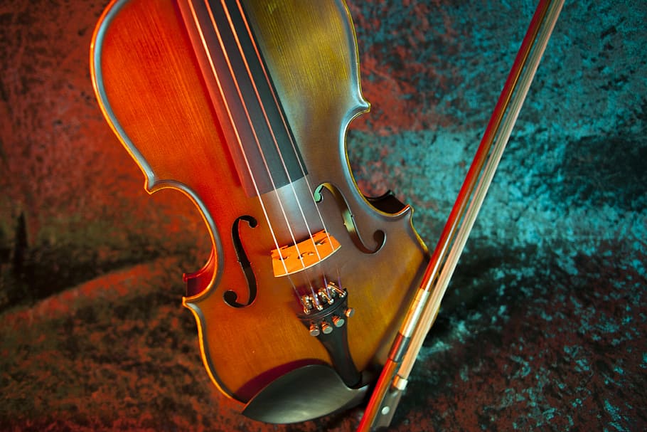 photo of violin with lighting effects, instrument, bow, strings