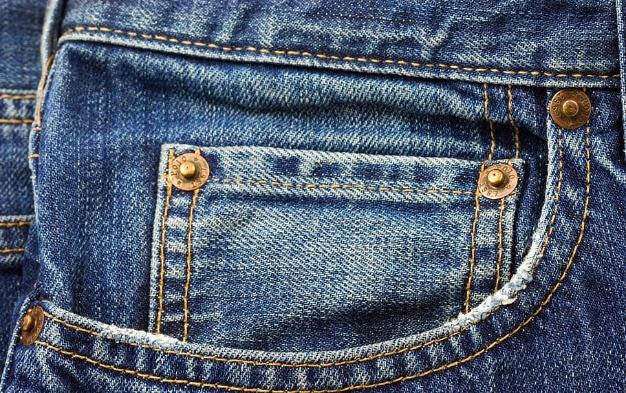 close up photo of blue denim bottoms pocket, jeans, fashion, clothing