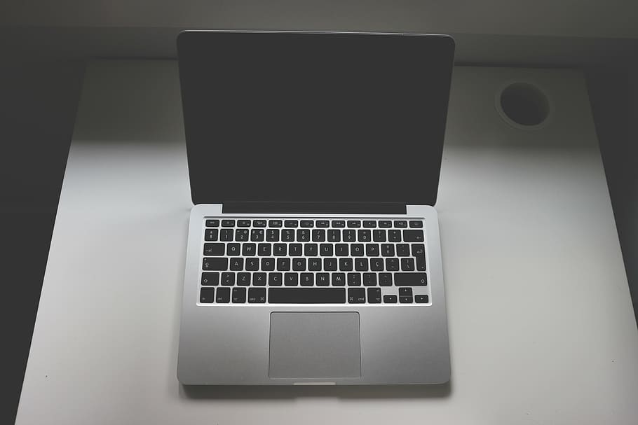 turned-off MacBook Pro on white table, laptop, computer, technology HD wallpaper
