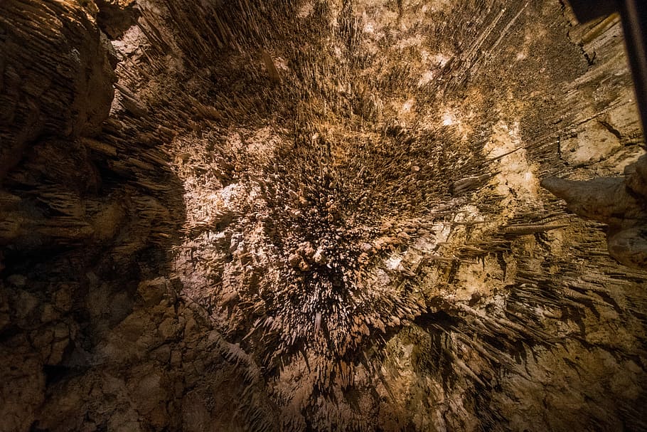 brown rocky surface, brown stalagmites and stalactites, cave HD wallpaper