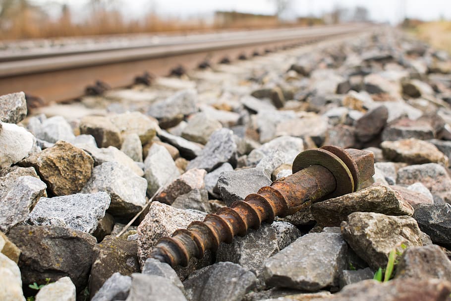 screw, outdoors, track, steel, rusty, stones, gravel, ties HD wallpaper