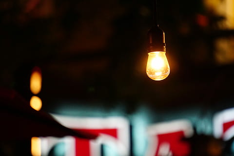 turned on light bulb, photo of light bulb under brown ceiling HD wallpaper