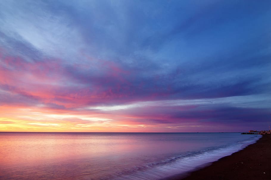 body of water and seashore, calm body of water under cloudy sky HD wallpaper