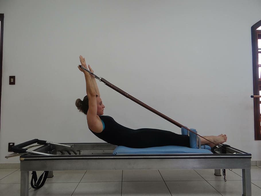 woman lying on gray exerciser, Pilates, Physical Therapy, Posture HD wallpaper