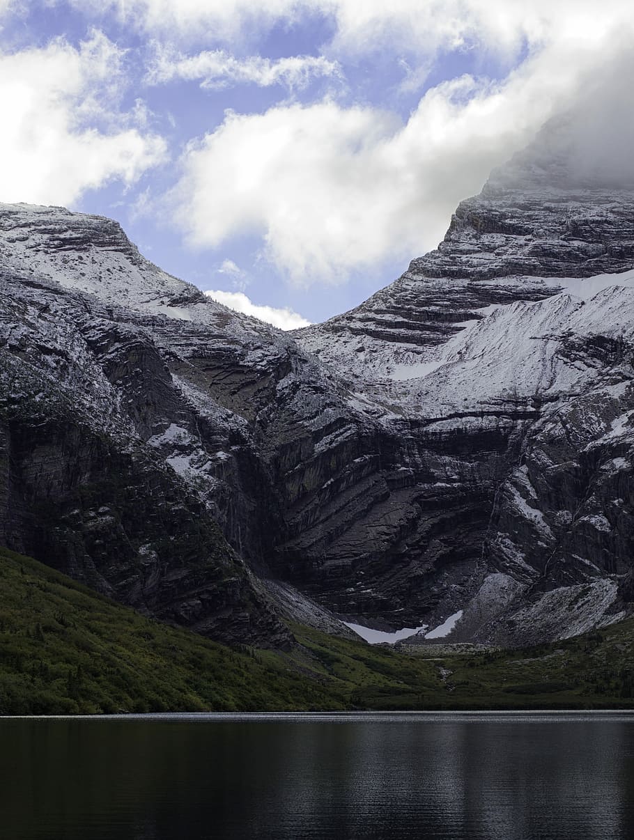 selective focus photography of mountain, gray mountain with clouds HD wallpaper