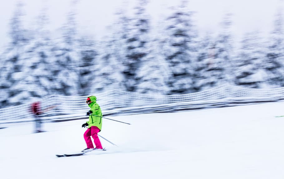 selective focus photography of person on ski blades at ski track, person skiing on snow HD wallpaper