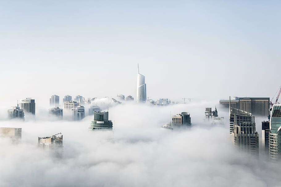 city buildings surrounded with clouds at daytime, structure HD wallpaper