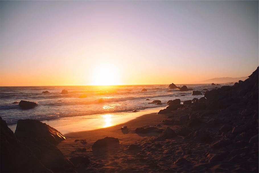 sunset at seashore, beach, sand, water, waves, ocean, horizon HD wallpaper