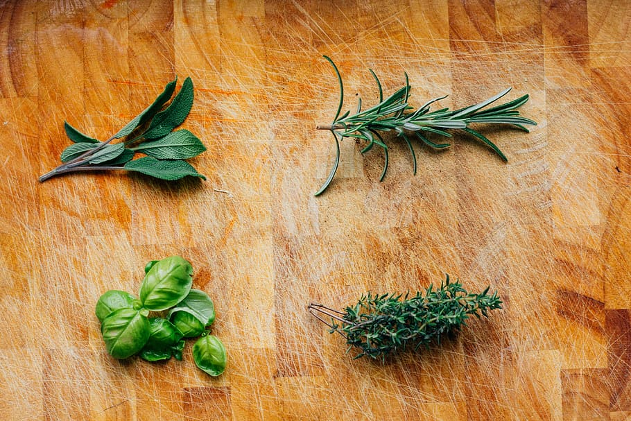 Fresh green herbs, basil, rosemary, sage, thyme, spice, wood - Material