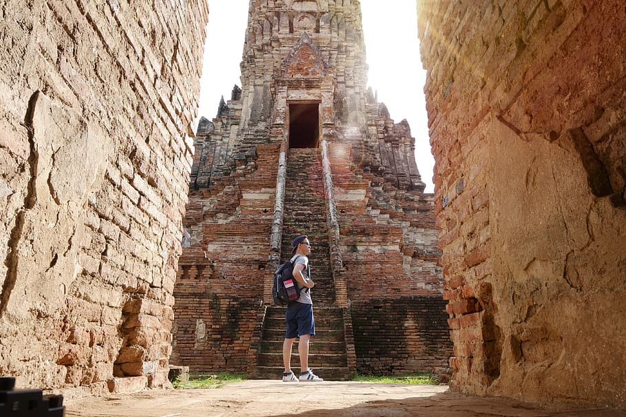 man, person, bricks, travel, attraction, backpack, brickwalls HD wallpaper