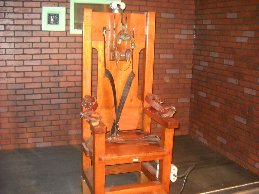 brown wooden armchair, electric chair, death row, execution, crime